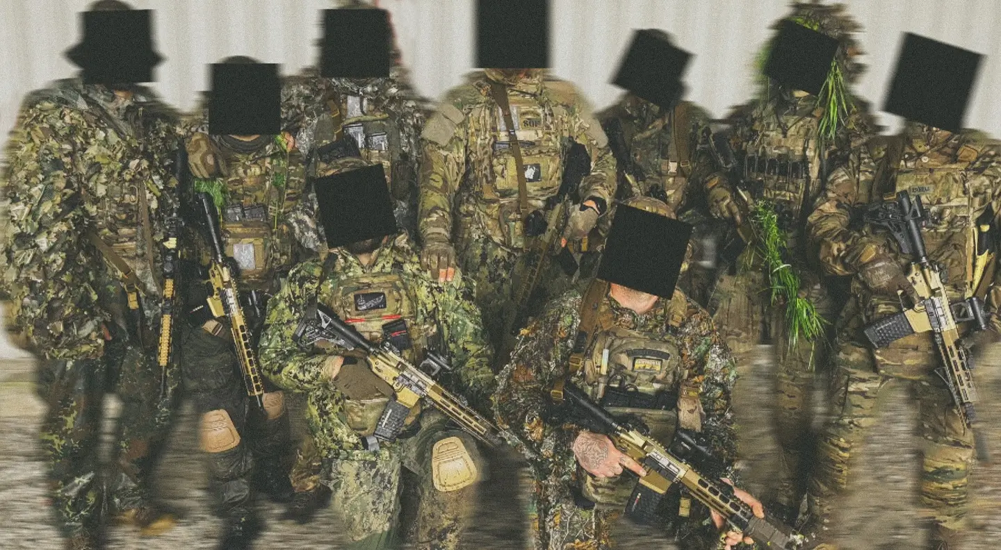 Group shot of a SOF team which is fully equipped with MK 556 assault rifles