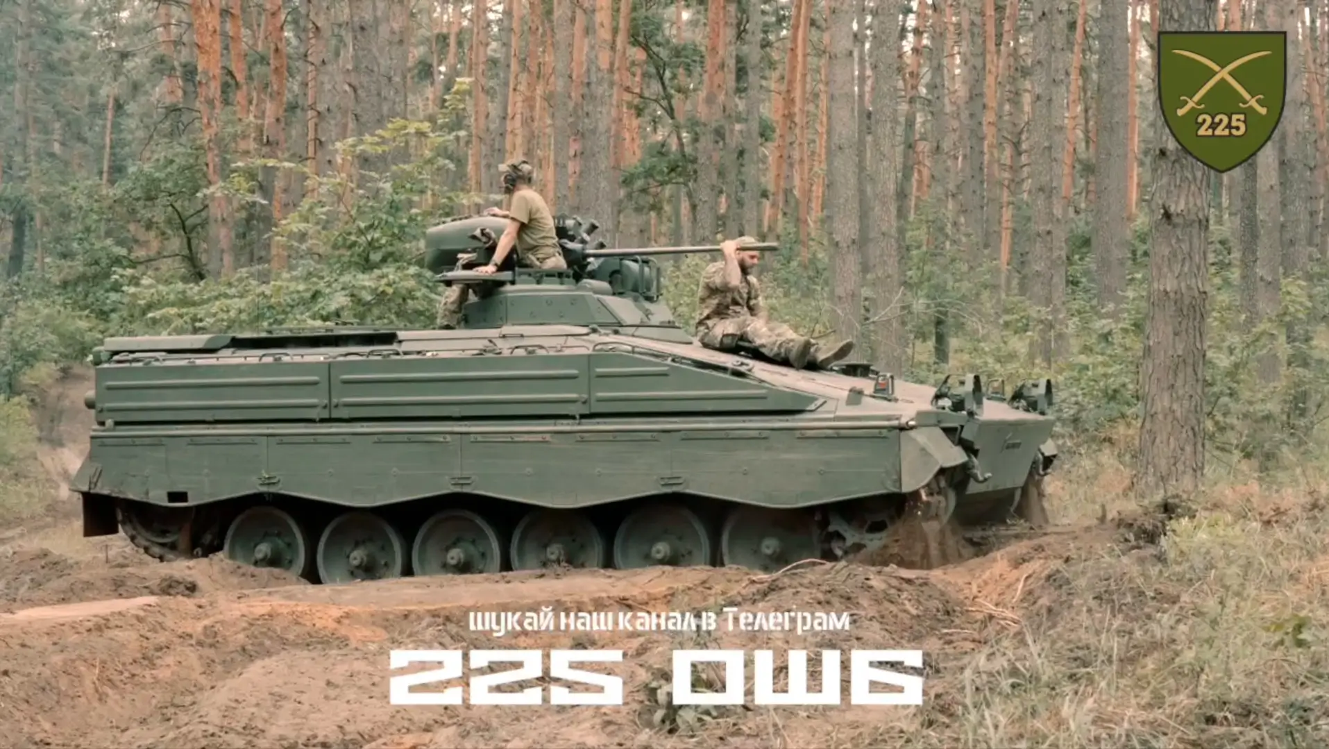 A Marder 1A3 IFV driving in Ukraine with soldiers on top of it