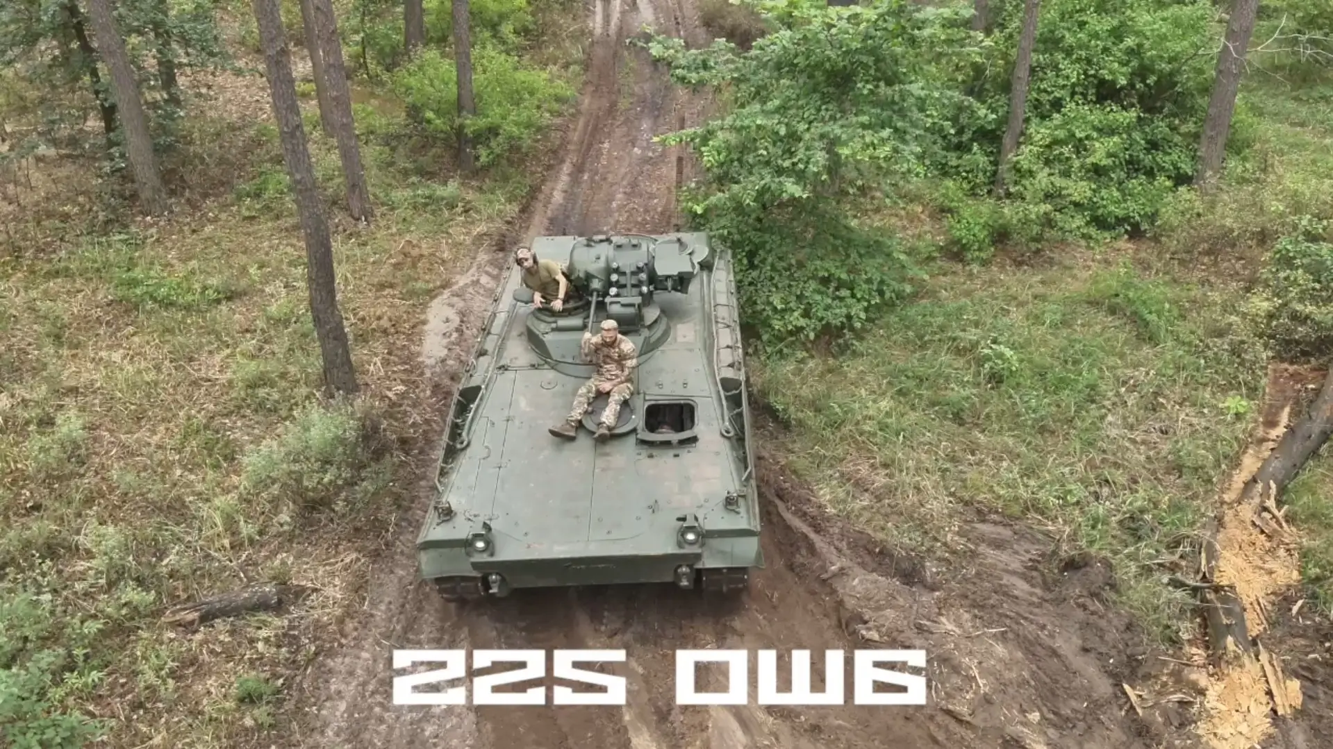 A Marder 1A3 IFV driving in Ukraine with soldiers on top of it