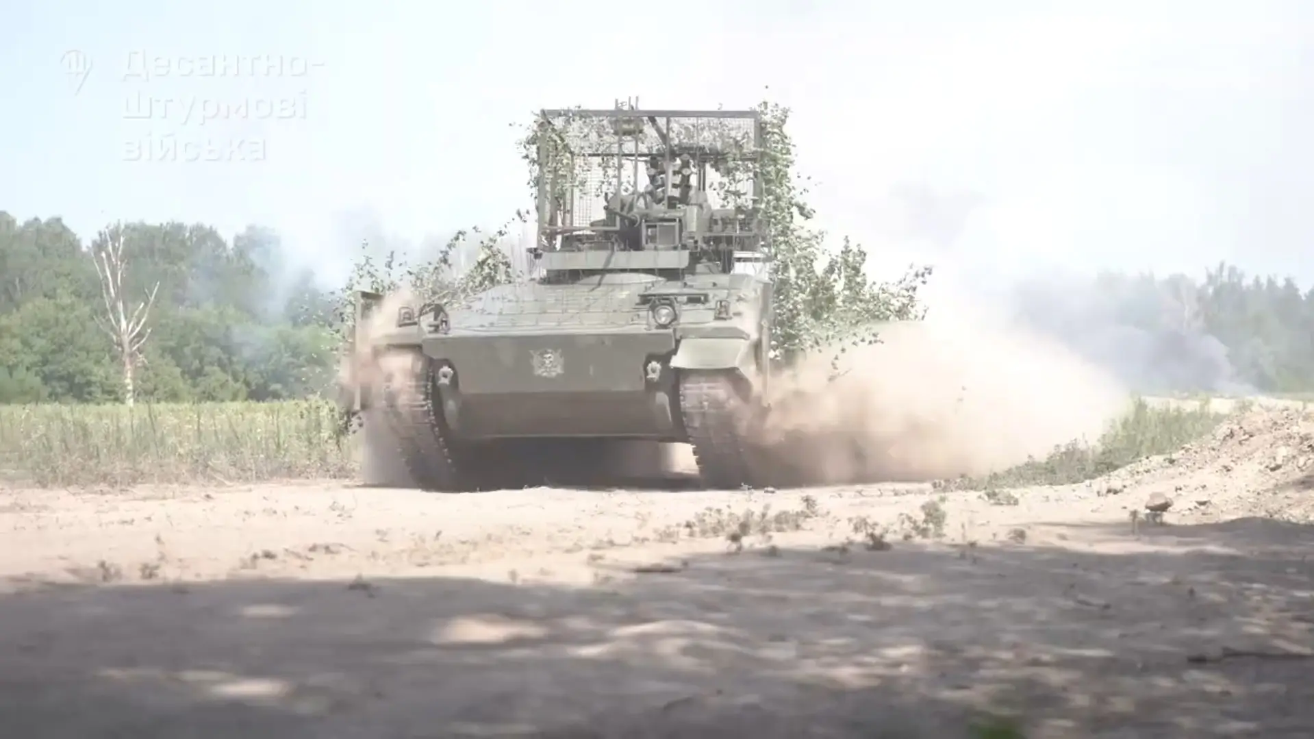 Marder 1A3 IFV with drone cage, jammer, and camouflage made from natural materials