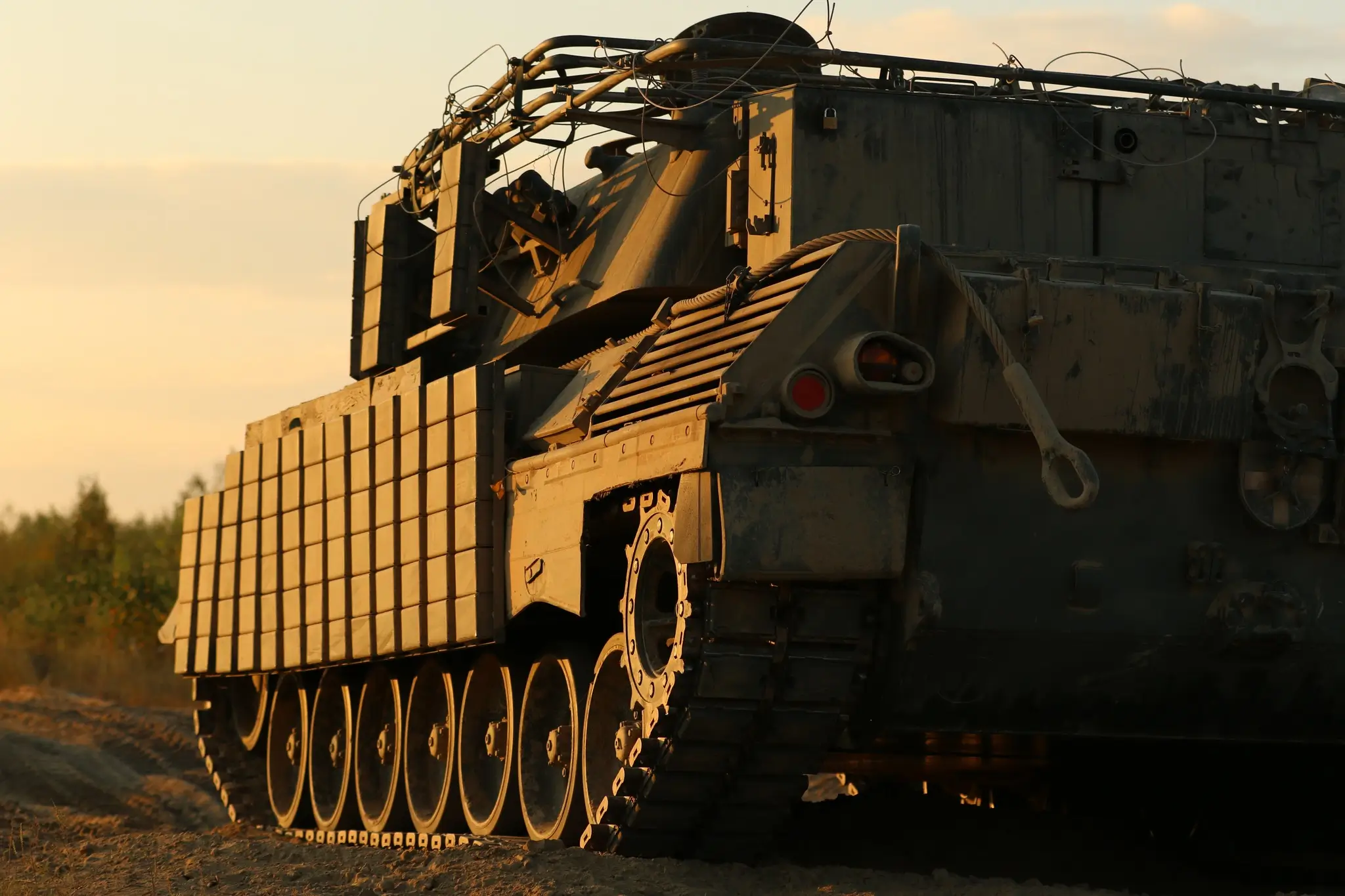 Leopard 1A5 with plenty of additional reactive armour and an installation for a drone net