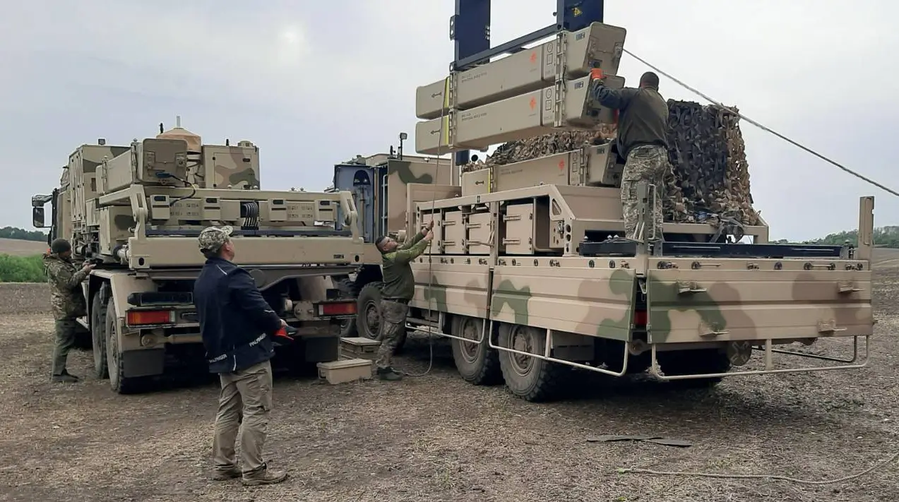 Logistics Specialists of the Air Command West reload an IRIS-T SLM launcher