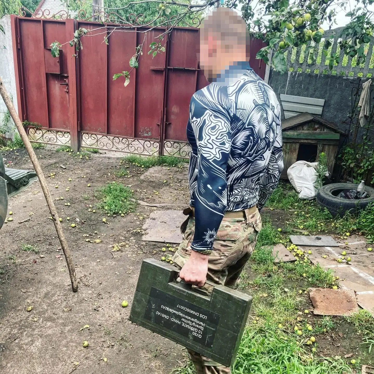 Soldier is carrying a case with DM51A2 hand grenades inside