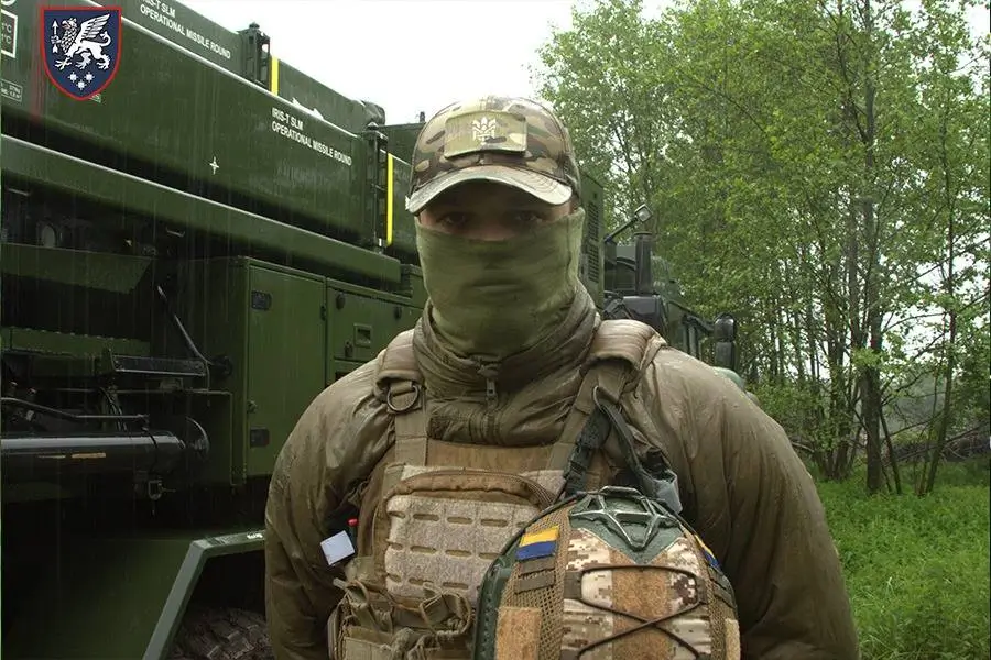 Ukrainian soldier in front of one of his IRIS-T SLM launchers