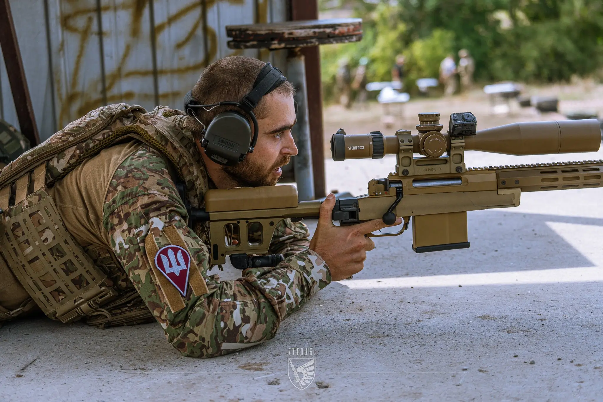 Ukrainian soldier operates on an HLR 338 precision rifle