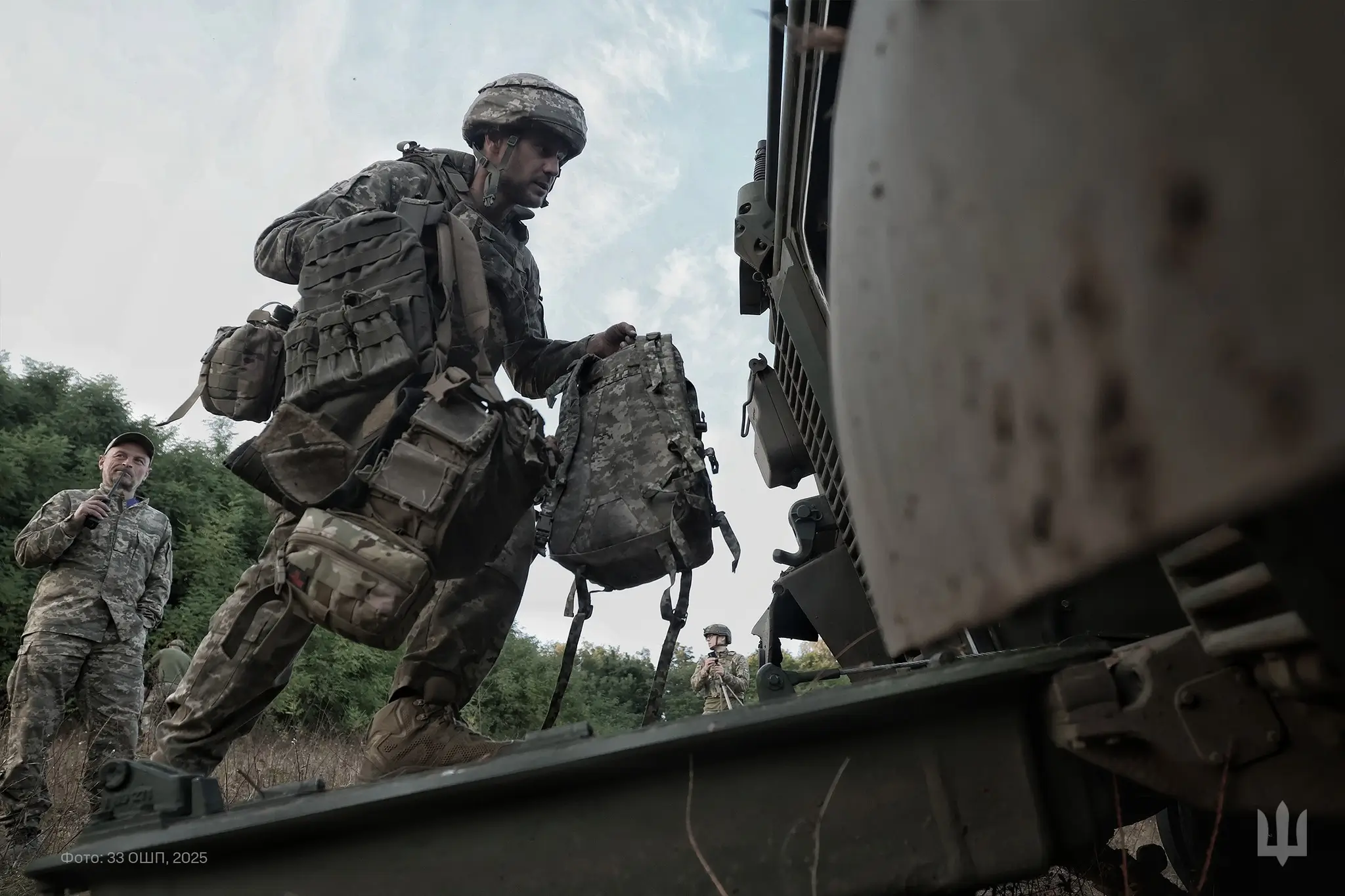 Ukrainian soldiers enter a Marder 1A3