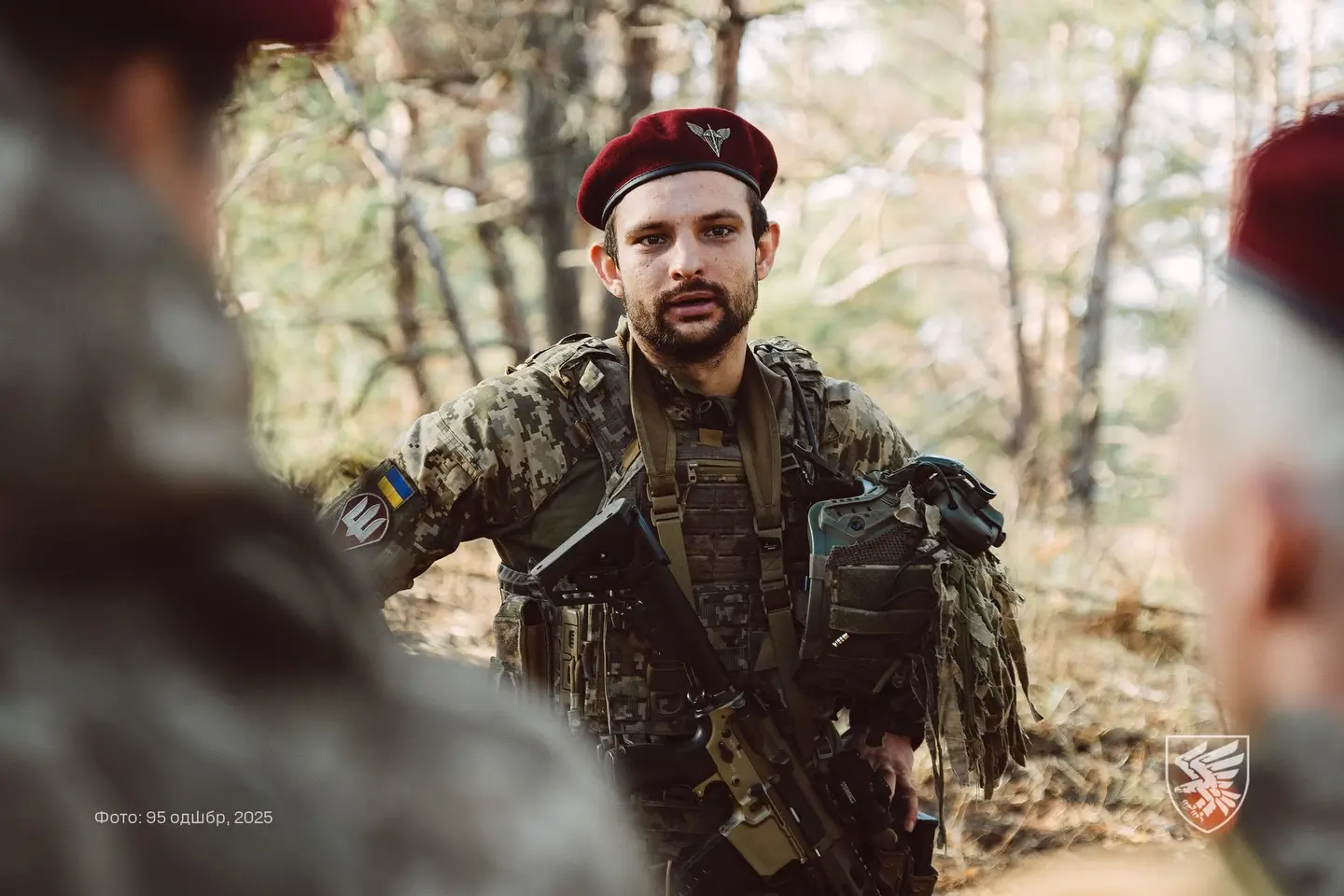 Ukrainian soldier carries an MK 556 assault rifle