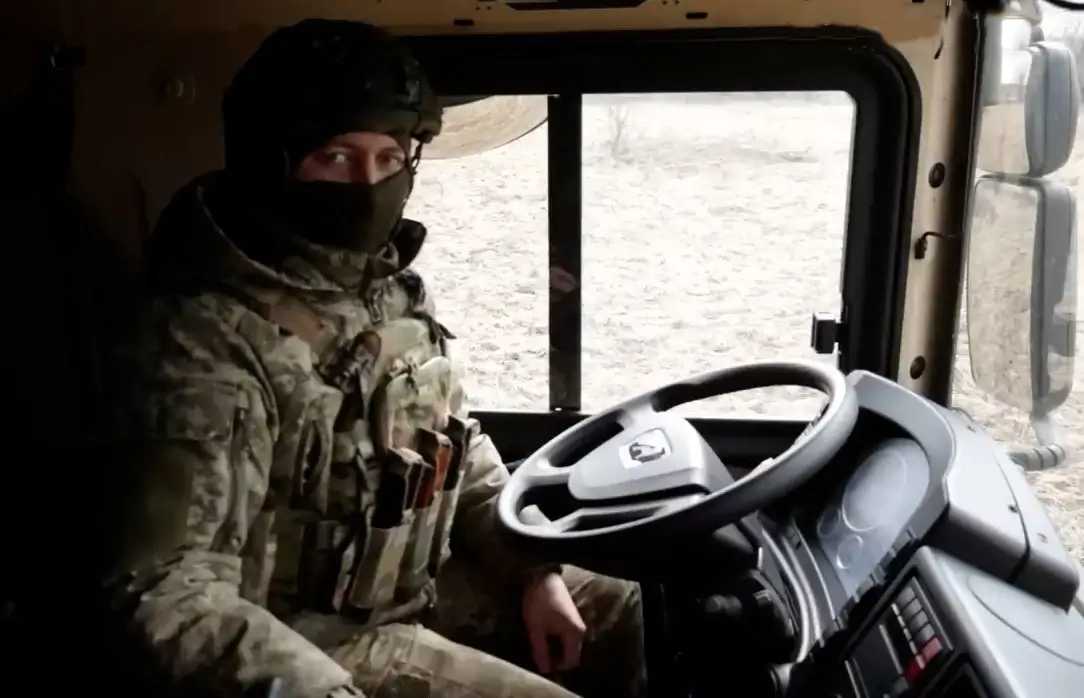 Soldier sits inside a vehicle belonging to an IRIS-T SLM fire unit
