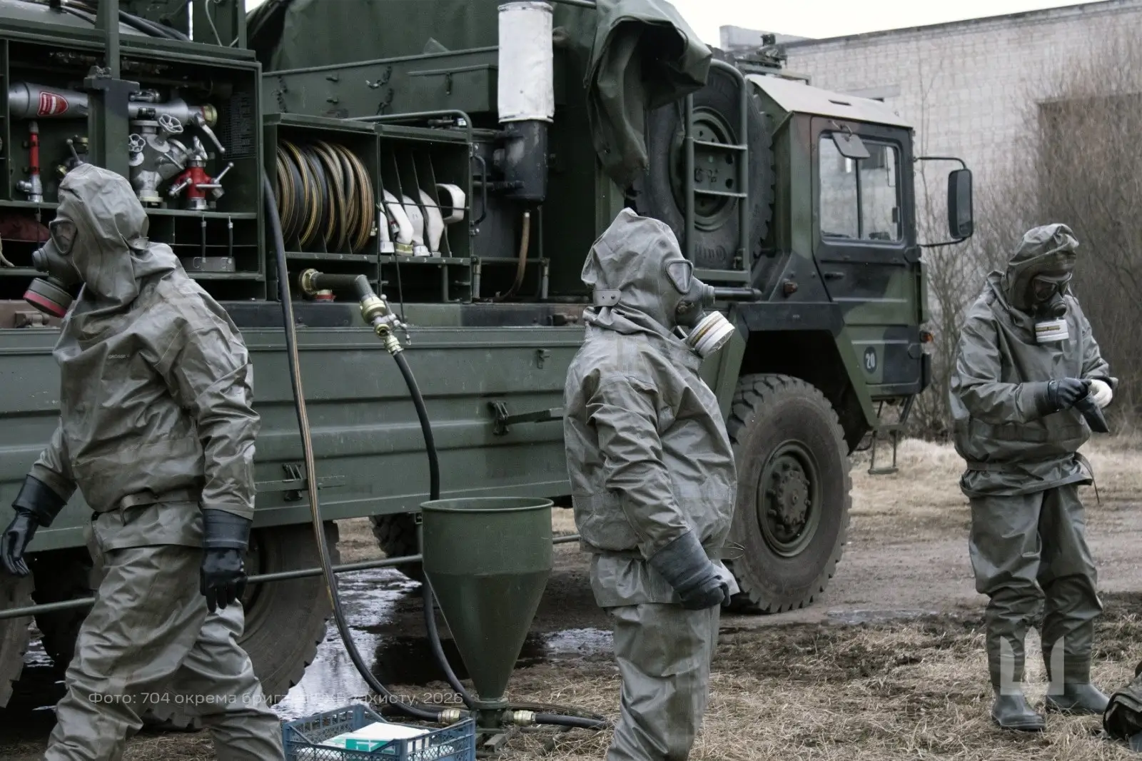 Soldiers during a training exercise with a mobile decontamination vehicle HEP 70
