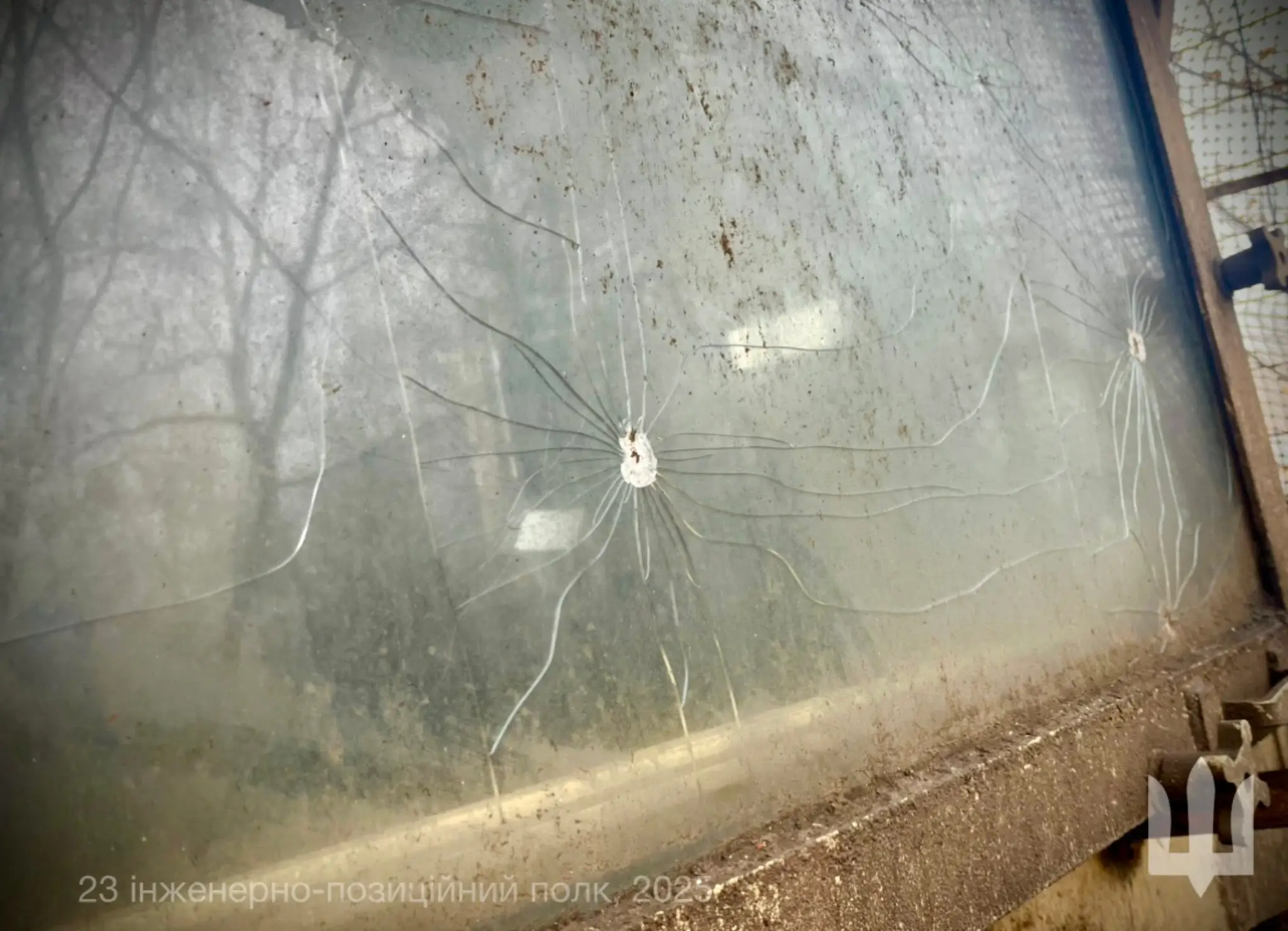 Shattered glass of a JCB HMEE