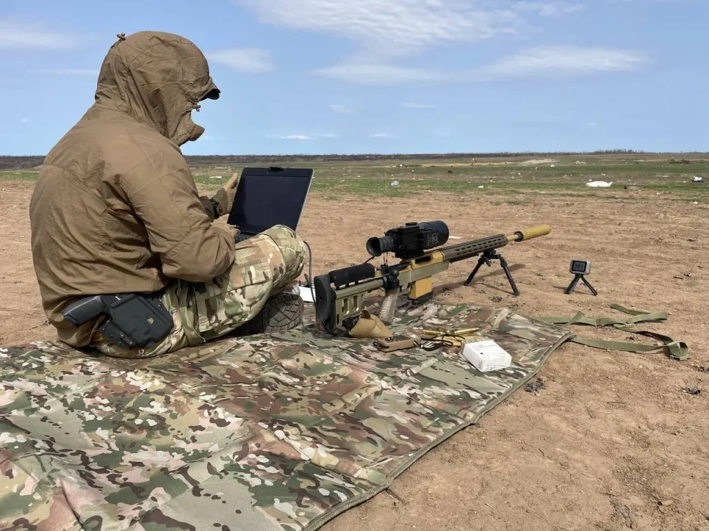 The long-range precision rifle HLR 338 in service with a Ukrainian soldier at a shooting range