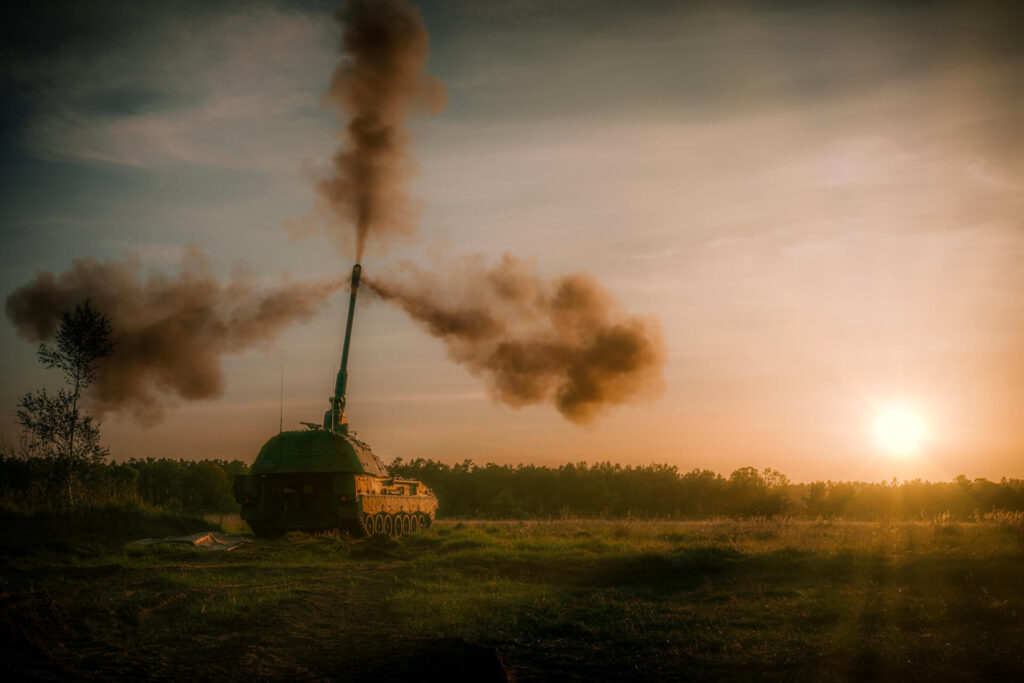 PzH 2000 shooting during sunset