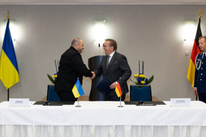Umerov and Pistorius shake hands